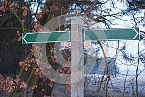 blank street sign against forest on trees background. Germany