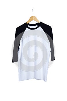 Blank t shirt raglan 3/4 sleeves front view with black and white color on wood hanger isolated on white background, ready for