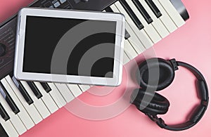 Blank tablet on studio keyboard for Music application