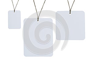 Blank tag tied for hang on product for show price or discount isolate on white background with clipping path