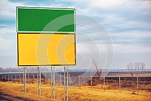 Blank traffic road sign by the roadway