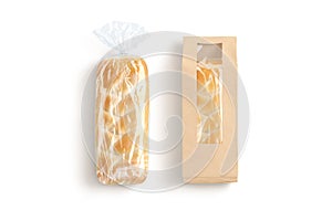 Blank transparent cellophane and craft paper bread pack mockup, isolated