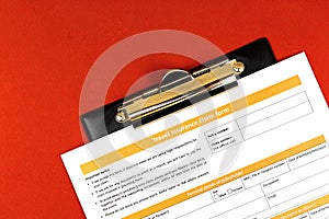 Blank travel insurance claim form, travel official documant on the table, concept top view