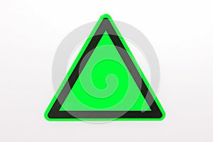 Blank triangle hazard, attention, warning, danger sign. Empty triangular sticker in green and black colors
