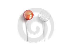 Blank two caramel lollipop with white wrapper mockup lying, isolated photo