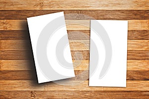 Blank Vertical Business Cards on Wooden Table