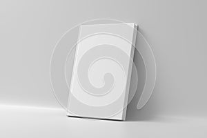 Blank vertical hardcover book cover mockup standing on white background