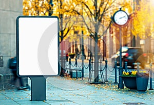 Blank vertical outdoor billboard mockup on city street