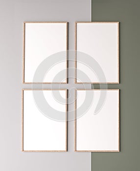 Blank vertical poster frame mock up on beige and green background. Four wooden wooden frames