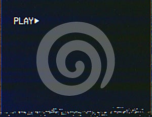 Blank vhs screen with play symbol background