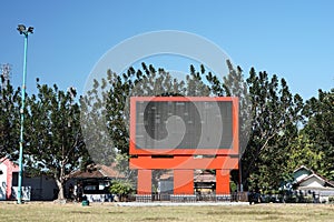 A blank videotron or Large LED display in a park, can be used as a mock up