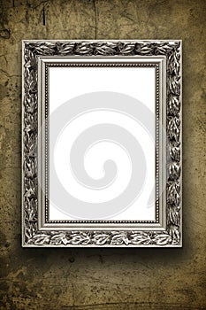 Blank vintage arrtframe on grunge wall
