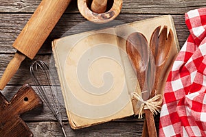 Blank vintage recipe cooking book and utensils