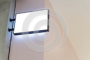Blank wall mounted lightbox signage for advertisement or branding with modern minimal interior background