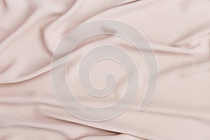 Blank waving pink fabric background