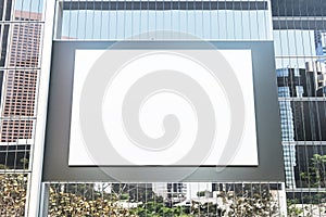 Blank white billboard with black frame on the wall of modern building with mirror windows. 3D rendering, mockup