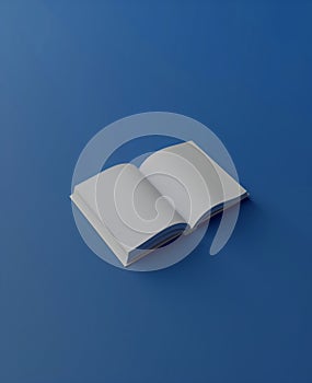 Blank white book mockup. The cover of a book is white on a blue background empty book.