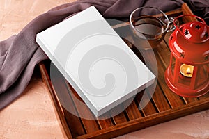 Blank White Book with Tea and Lamp for Mockups