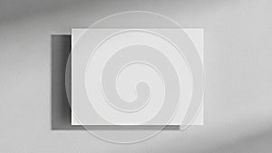 Casts a subtle shadow on the wall, suggesting a light source from above