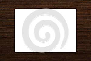 Blank white card abstract on natural brown wood plank texture background