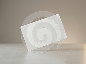 Blank white card with rounded corners on a neutral background