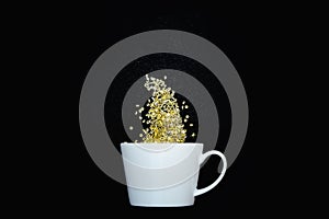 Blank white ceramic mug with yellow crystals and glitter