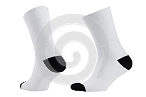 Blank white cotton long sock with black heel on invisible foot isolated on white background as mock up for advertising, branding.