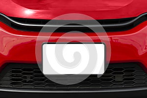 Blank White Front License Plate On Red Car With Copy Space