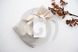 Blank white gift or favor tag mockup with autumnal colours