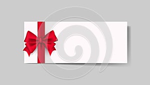 Blank white gift voucher with red ribbon bow or empty gift signboard isolated on grey background with shadow minimal