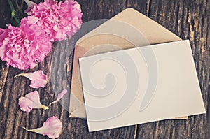 Blank white greeting card with brown envelope