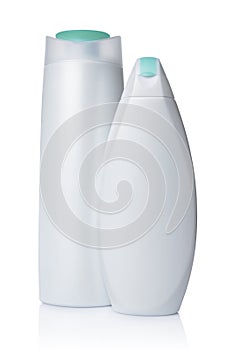 Blank white mockup plastic bottles of cosmetic products