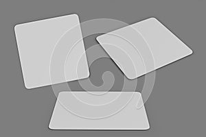 Blank white mouse-pad mockup isolated over gray background.