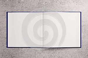 Blank white notepad on concrete surface