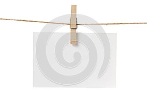 Blank white paper card hanging