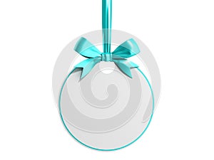 Blank white paper round frame tag label card template hanging with shiny blue ribbon and bow isolated on white background 3D