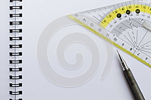 Blank White Paper of Wirebound Notebook with Mechanical Pencil and Set Square.