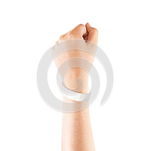 Blank white paper wristband mock up on persons arm