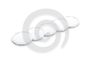 Blank white plastic round chip mockup lying row, side view