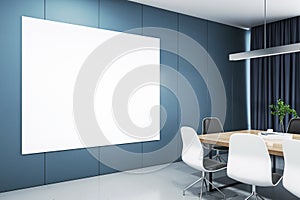 Blank white poster on a wall in a modern meeting room with wooden office desk and chairs, mockup. 3D Rendering