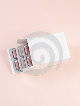 Blank White Product Package medicine drug. Box Mockup..In an open box, a blister with a vitamin. Place for logo and text