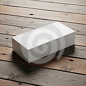Blank white rectangular box on rustic wooden surface