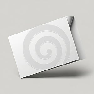 Blank white rectangular card leaning against a subtle shadow on a clean white background isolated on white background