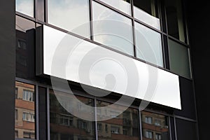 Blank white restaurant or shop sign mockup, large billboard banner on a storefront template