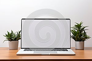 Blank white screen with laptop computer mockup isolated on office desk background