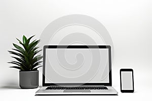 Blank white screen with laptop computer mockup isolated on office desk background