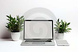 Blank white screen with laptop computer mockup isolated on office desk background