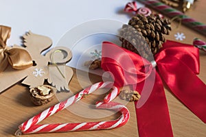 Blank white sheet of paper surrounded with festive christmas decorations. Merry Christmas and Happy New Year. Xmas concept. Top