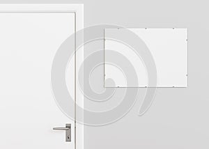 Blank white signboard hanging on the wall indoors. Empty signplate mock up. Name plate with copy space. Door sign photo