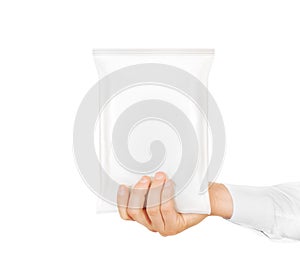Blank white snack bag mock up hold in hand isolated